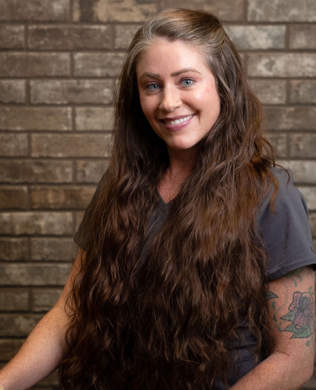 Mindy women standing and smiling